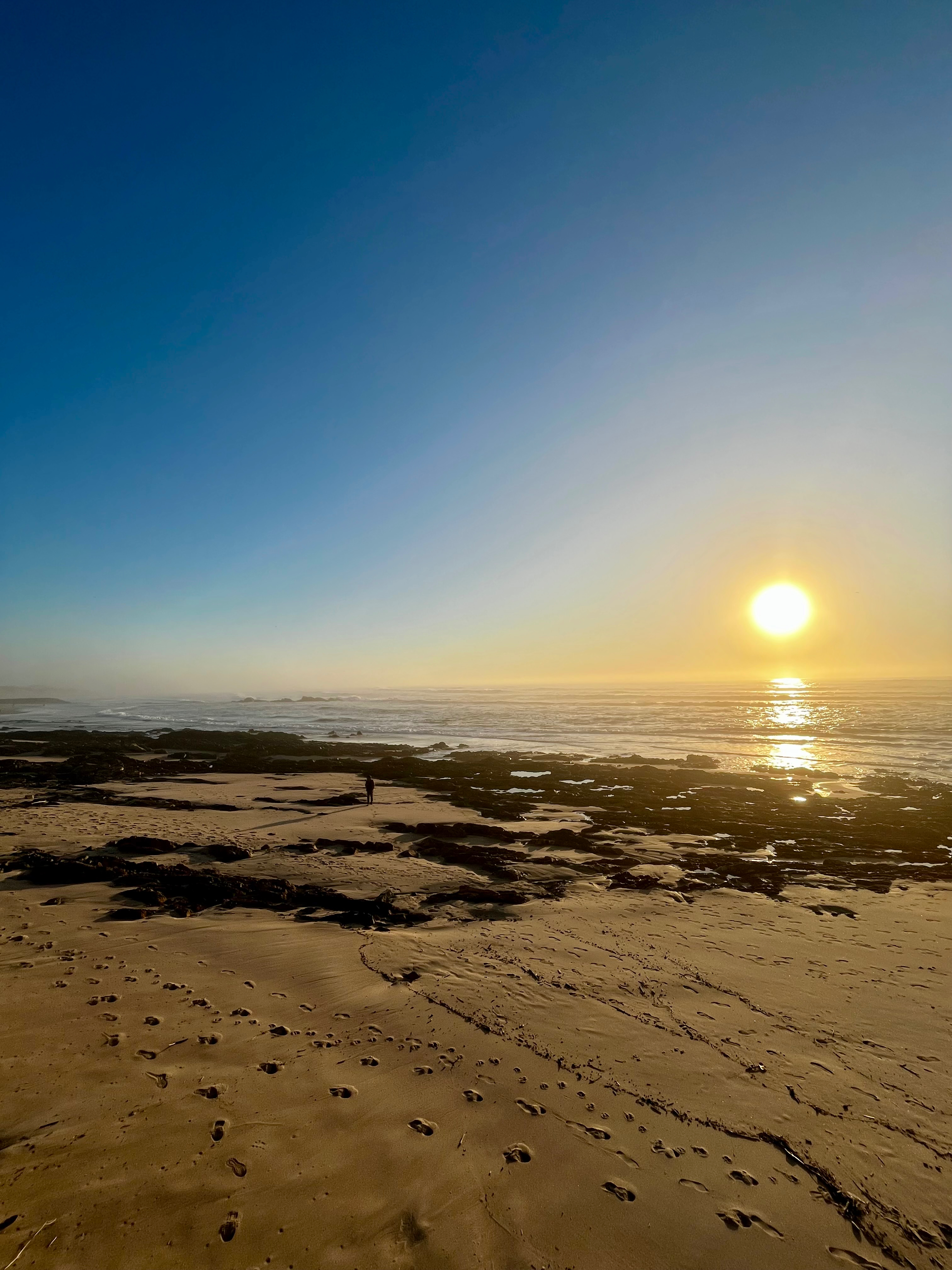 One person. One sun. The Atlantic doing the rest.