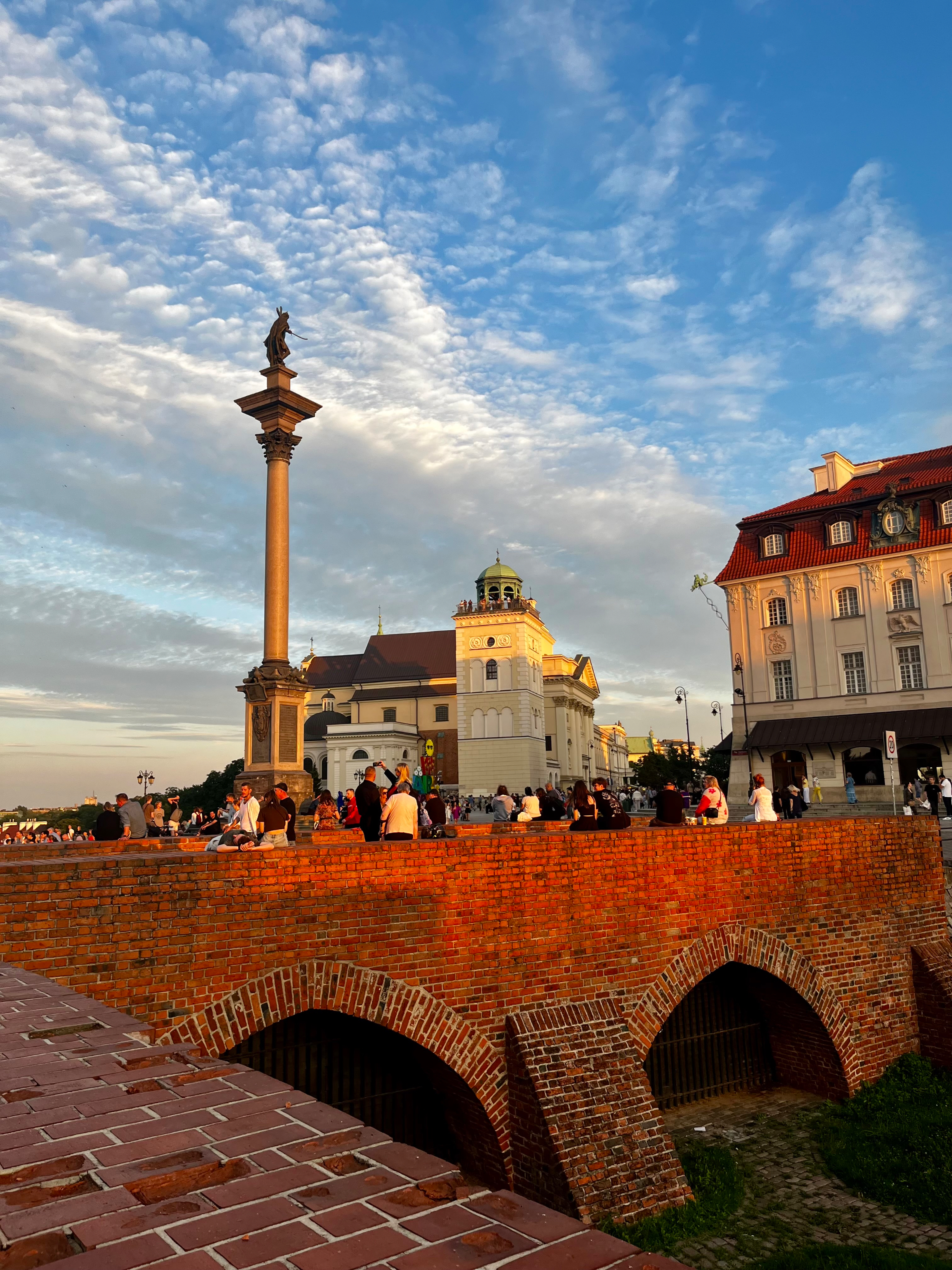 In the quiet warmth of late light, a city's soul in red bricks and green domes